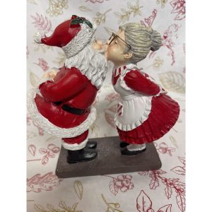 couple mére-noël & pére-noël qui s'embrassent