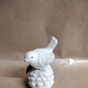 Oiseau blanc pailleté